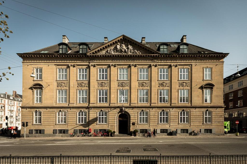 Stone facade of an early twentieth century institutional building